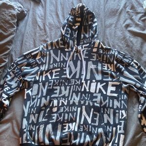 Nike all over print, black, grey, and white pull over hoodie